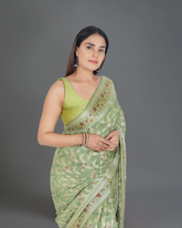 Green Khaddi Georgette Saree with Intricate Weaving