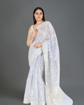 Regal Charm: Brown Banarasi Cotton Silk Saree with Jali Design and Detailed Border