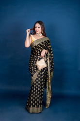 Pure Khaddi Georgette black colour handloom Saree with meenakari woven booty all over