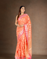 Vivid Harmony: Orange Chanderi Cotton Silk Saree with Magenta Zari Border