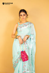 Sky Blue Jimmy Choo saree with Swarovski work in peacock pattern