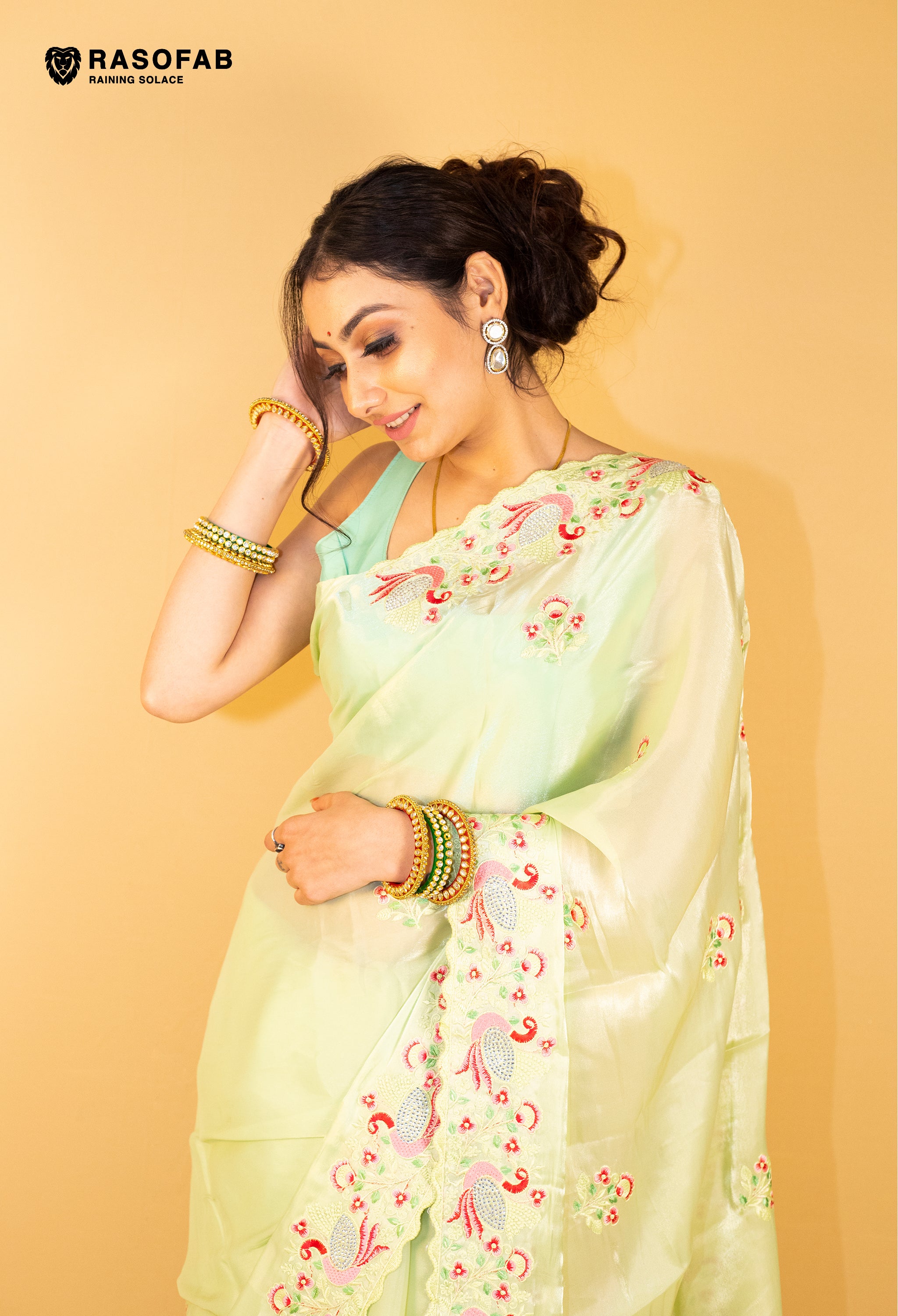 Light Green Jimmy Choo Saree with Swarovski work in peacock