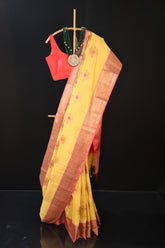 Yellow Chanderi Cotton Banarasi Silk Saree With Red Border