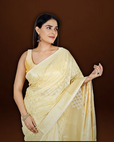 Serene Splendor: Cream Banarasi Cotton Saree with Beautiful Motif Border