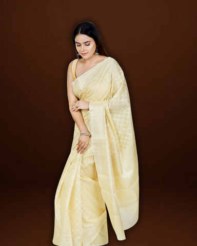 Serene Splendor: Cream Banarasi Cotton Saree with Beautiful Motif Border