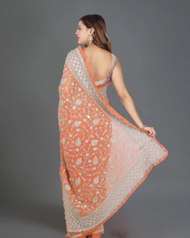 Designer Delight: Orange Georgette Saree with Exquisite Embroidery